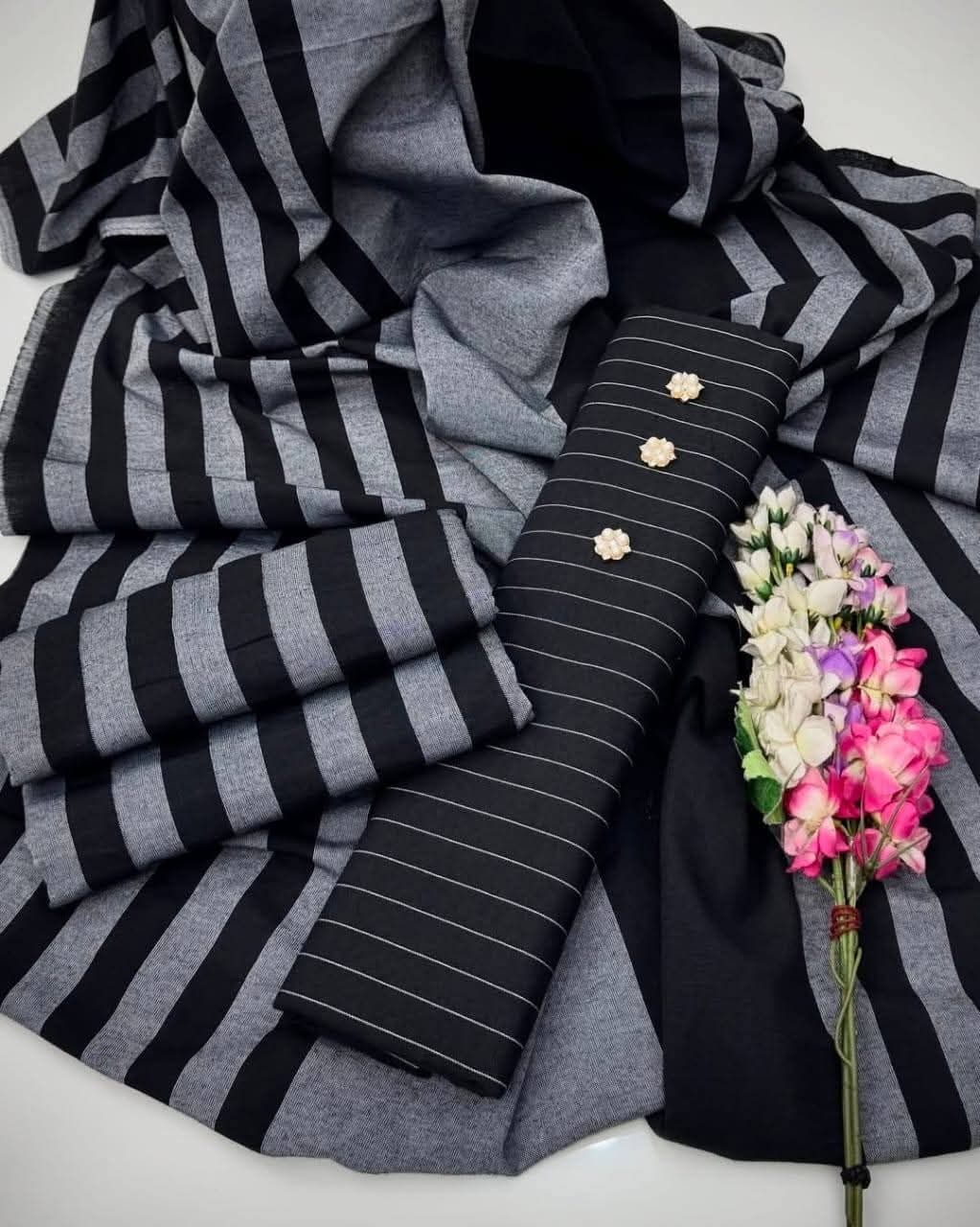 Black Marina suit fabric detail